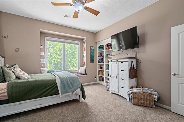 8709 Pine St, Lenexa, KS 66220 - bedroom featuring carpet and a ceiling fan