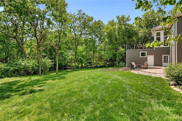 8709 Pine St, Lenexa, KS 66220 - view of green lawn with a patio area