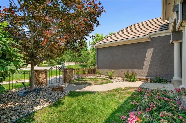 8709 Pine St, Lenexa, KS 66220 - view of yard with a gate