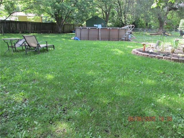 112 Spruce St, Garden City, MO 64747 - view of yard