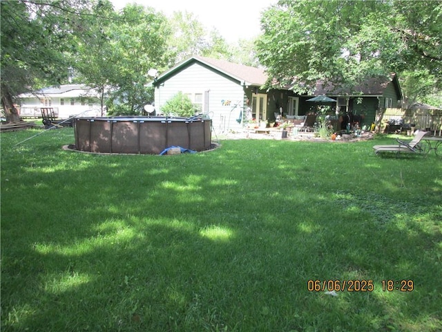 112 Spruce St, Garden City, MO 64747 - view of yard featuring an outdoor pool