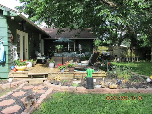 112 Spruce St, Garden City, MO 64747 - view of yard featuring a wooden deck and an outdoor living space
