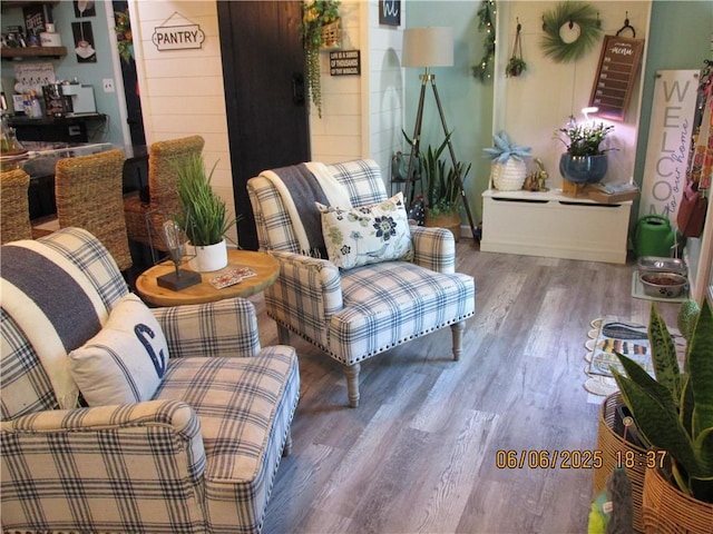 112 Spruce St, Garden City, MO 64747 - living room featuring wood finished floors