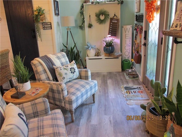 112 Spruce St, Garden City, MO 64747 - living room featuring wood finished floors and healthy amount of natural light