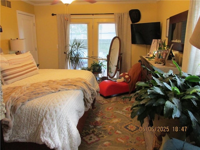 112 Spruce St, Garden City, MO 64747 - bedroom with ornamental molding and french doors