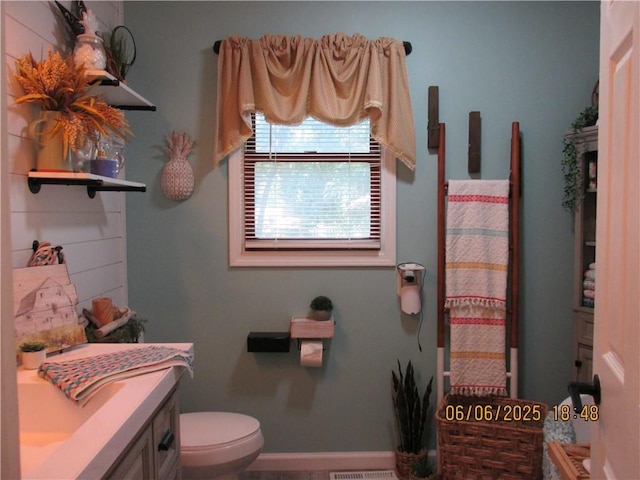 112 Spruce St, Garden City, MO 64747 - bathroom with toilet and vanity