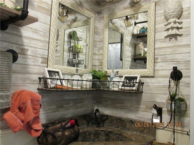 112 Spruce St, Garden City, MO 64747 - bathroom featuring wooden walls