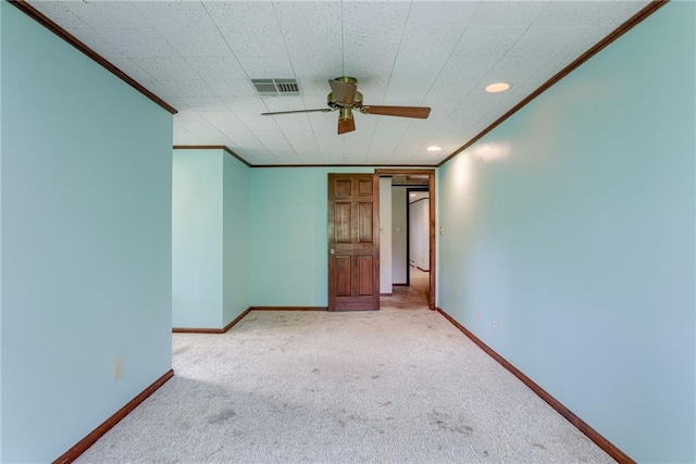 3437 Shrine Park Rd, Leavenworth, KS 66048 - empty room with ornamental molding, carpet flooring, a ceiling fan, and recessed lighting