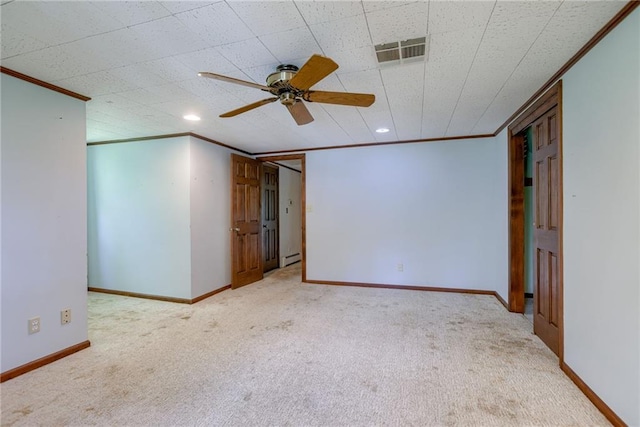 3437 Shrine Park Rd, Leavenworth, KS 66048 - carpeted empty room with ornamental molding, ceiling fan, recessed lighting, and a baseboard heating unit