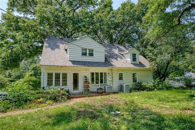 3437 Shrine Park Rd, Leavenworth, KS 66048 - cape cod home with a front lawn and a shingled roof
