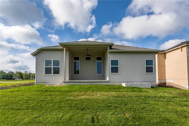 18722 W 169th Ter, Olathe, KS 66062 - rear view of house featuring a ceiling fan and a lawn