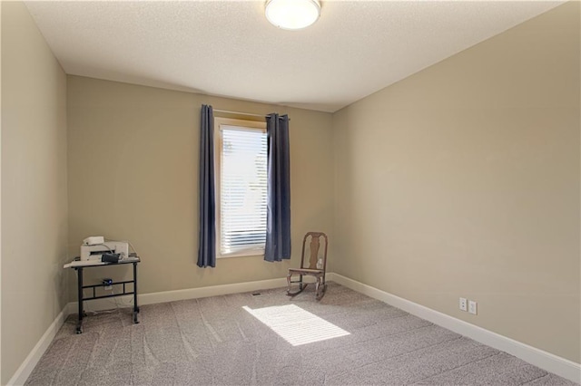 16321 Nieman Rd, Overland Park, KS 66062 - carpeted spare room with baseboards and a textured ceiling
