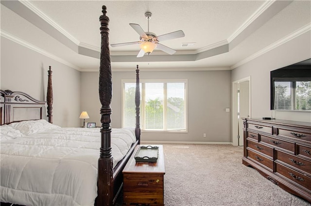 16321 Nieman Rd, Overland Park, KS 66062 - bedroom featuring a raised ceiling, multiple windows, crown molding, light colored carpet, and ceiling fan