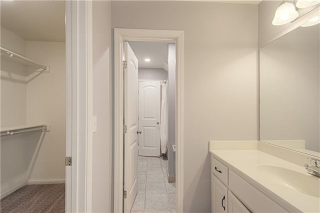 16321 Nieman Rd, Overland Park, KS 66062 - full bath featuring vanity, tile patterned flooring, and recessed lighting