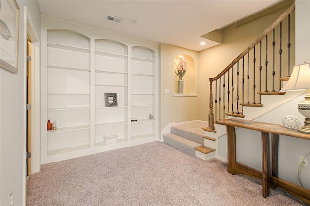 16321 Nieman Rd, Overland Park, KS 66062 - foyer entrance with carpet, stairway, and recessed lighting