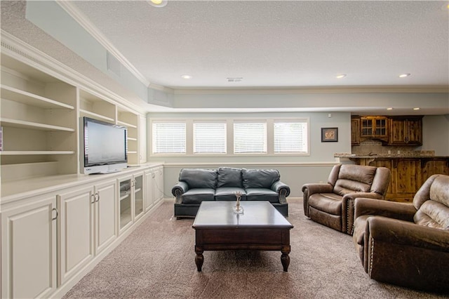 16321 Nieman Rd, Overland Park, KS 66062 - living area with a textured ceiling, ornamental molding, carpet flooring, and recessed lighting