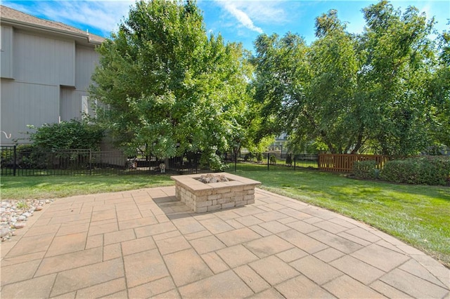16321 Nieman Rd, Overland Park, KS 66062 - fenced backyard with an outdoor fire pit and a patio