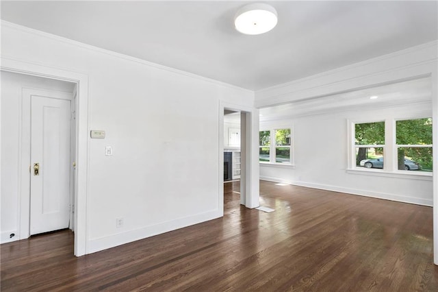 17 E 65th Ter, Kansas City, MO 64113 - unfurnished living room with wood finished floors, crown molding, and a fireplace