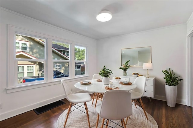 17 E 65th Ter, Kansas City, MO 64113 - dining space with ornamental molding and dark wood finished floors