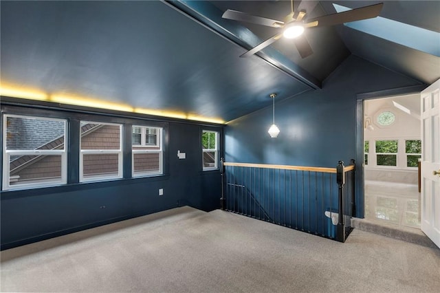 17 E 65th Ter, Kansas City, MO 64113 - unfurnished room featuring carpet flooring, lofted ceiling, ceiling fan, and a wainscoted wall