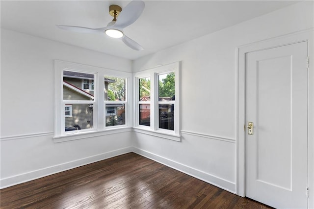 17 E 65th Ter, Kansas City, MO 64113 - unfurnished room with dark wood-style floors and ceiling fan