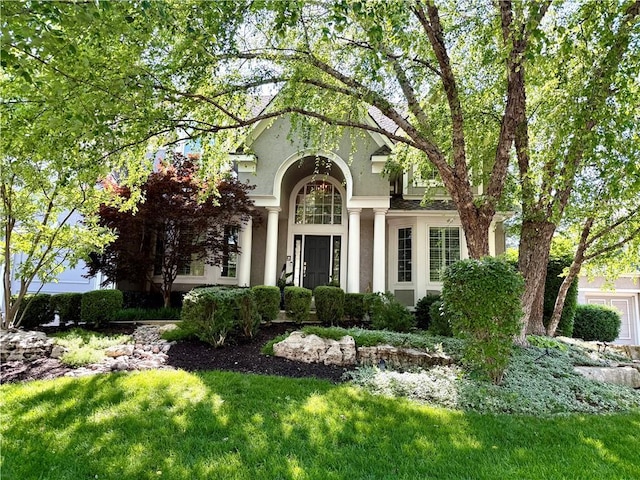 14911 Outlook Ln, Overland Park, KS 66223 - view of front of house with stucco siding and a front lawn