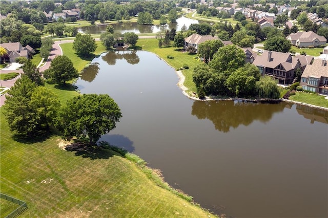 14911 Outlook Ln, Overland Park, KS 66223 - aerial view of residential area with a large body of water and a tree filled landscape