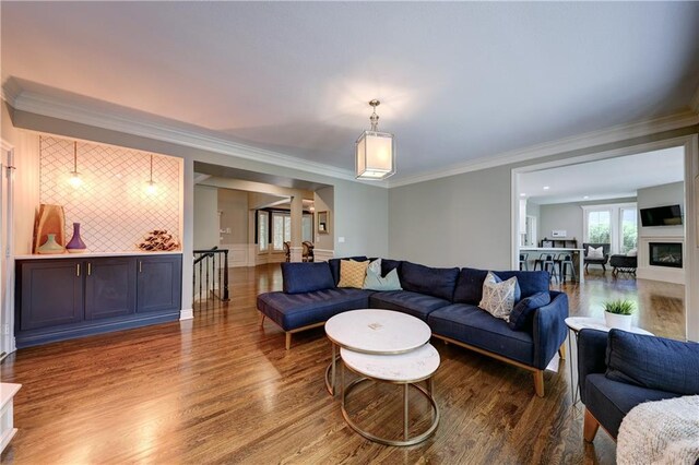 14911 Outlook Ln, Overland Park, KS 66223 - living room featuring wood finished floors and crown molding