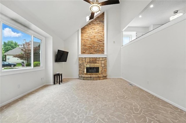 3437 N Wabash Ave, Kansas City, MO 64116 - unfurnished living room with carpet flooring, a ceiling fan, a fireplace, high vaulted ceiling, and recessed lighting