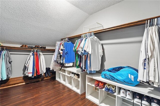 3437 N Wabash Ave, Kansas City, MO 64116 - walk in closet with wood finished floors and lofted ceiling