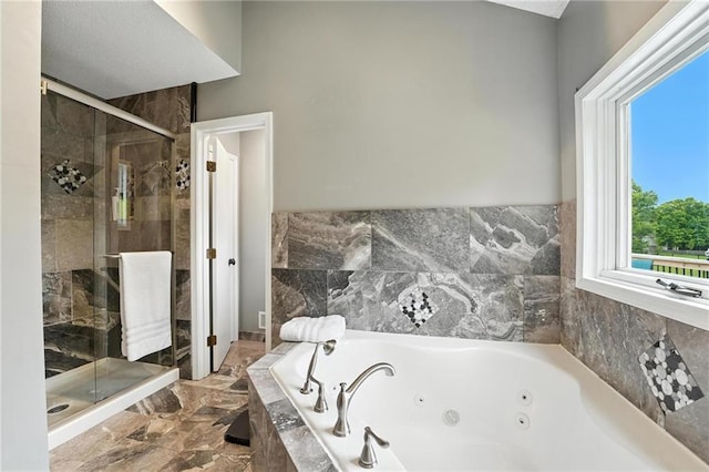 3437 N Wabash Ave, Kansas City, MO 64116 - full bath featuring a jetted tub, a shower stall, and marble finish flooring