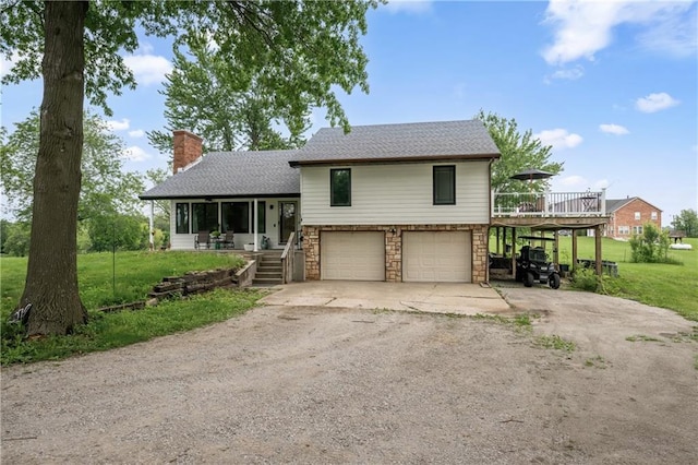 19109 Quinn Rd, Trimble, MO 64492 - tri-level home featuring driveway, a chimney, an attached garage, stone siding, and a front lawn
