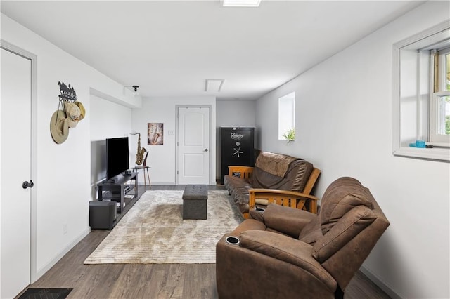19109 Quinn Rd, Trimble, MO 64492 - living area with wood finished floors and baseboards