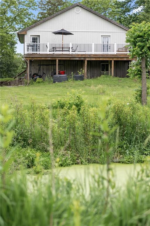 19109 Quinn Rd, Trimble, MO 64492 - rear view of property featuring a deck