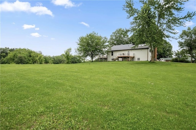 19109 Quinn Rd, Trimble, MO 64492 - view of green lawn featuring a deck