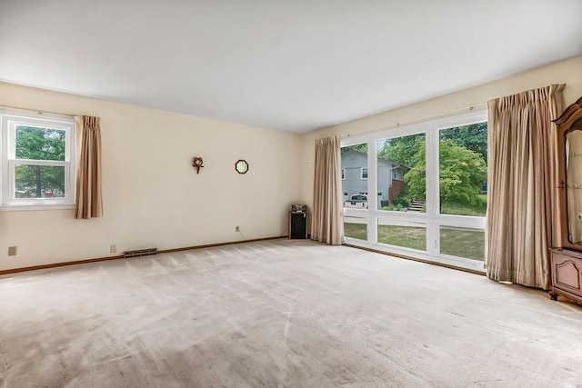 1310 N Leeview Cir, Olathe, KS 66061 - unfurnished living room featuring light carpet