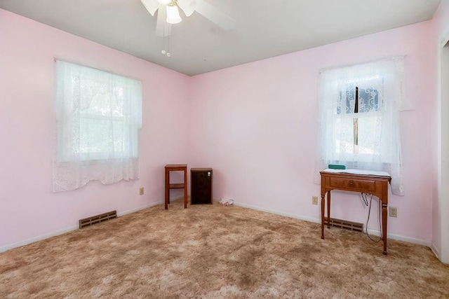 1310 N Leeview Cir, Olathe, KS 66061 - carpeted spare room with a ceiling fan