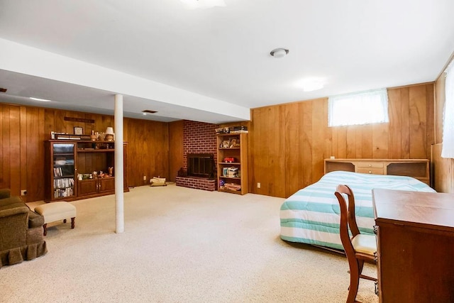 1310 N Leeview Cir, Olathe, KS 66061 - bedroom with wooden walls, carpet floors, and a fireplace