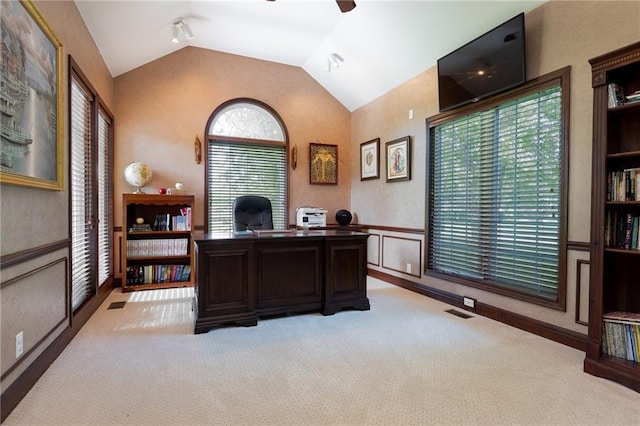 6501 N National Dr, Parkville, MO 64152 - office space with vaulted ceiling, ceiling fan, light carpet, and wainscoting