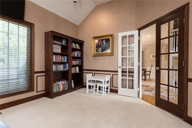6501 N National Dr, Parkville, MO 64152 - carpeted office space featuring french doors, lofted ceiling, and wainscoting