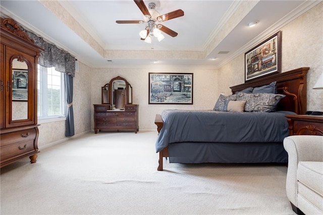 6501 N National Dr, Parkville, MO 64152 - bedroom with carpet floors, a raised ceiling, ornamental molding, and a ceiling fan