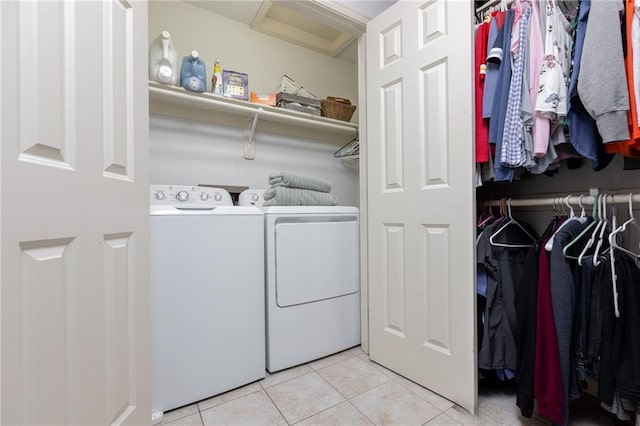 6501 N National Dr, Parkville, MO 64152 - laundry area featuring washing machine and dryer and light tile patterned floors