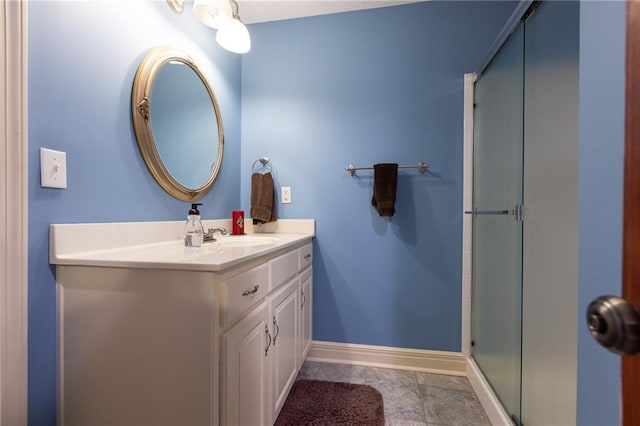 6501 N National Dr, Parkville, MO 64152 - full bathroom featuring vanity, baseboards, and a shower with door