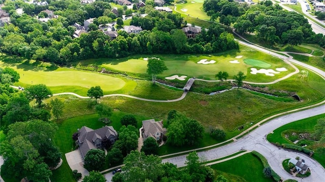 6501 N National Dr, Parkville, MO 64152 - aerial view of property and surrounding area featuring a golf club, nearby suburban area, and a tree filled landscape