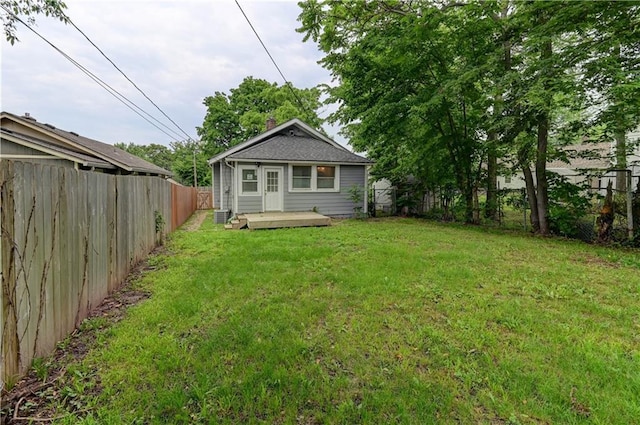 6117 Harrison St, Kansas City, MO 64110 - rear view of property featuring a wooden deck