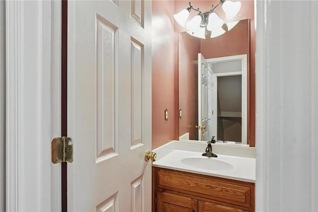 14876 S Summit St, Olathe, KS 66062 - bathroom with a chandelier and vanity