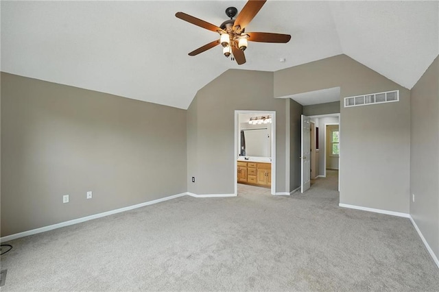 14876 S Summit St, Olathe, KS 66062 - unfurnished bedroom with vaulted ceiling, light colored carpet, connected bathroom, and ceiling fan