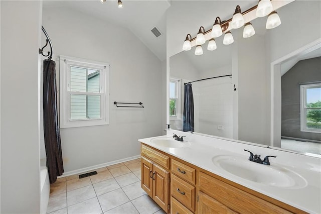14876 S Summit St, Olathe, KS 66062 - full bath with vaulted ceiling, double vanity, shower / tub combo, and tile patterned floors