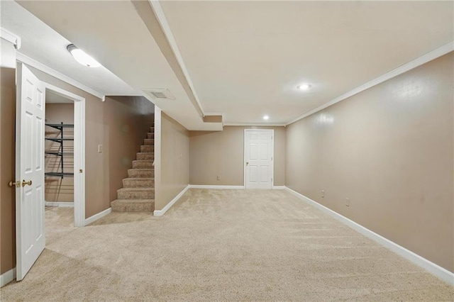 14876 S Summit St, Olathe, KS 66062 - finished below grade area with light colored carpet, crown molding, stairs, and recessed lighting