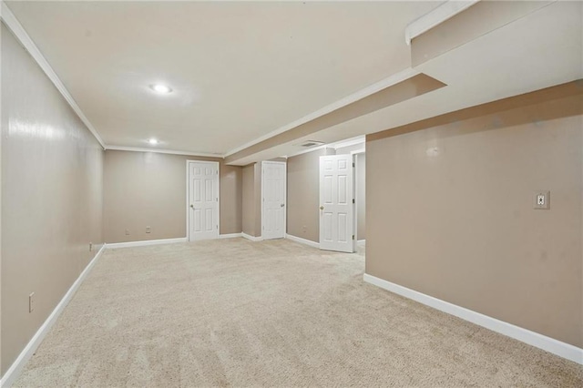 14876 S Summit St, Olathe, KS 66062 - finished below grade area featuring crown molding, light carpet, and recessed lighting